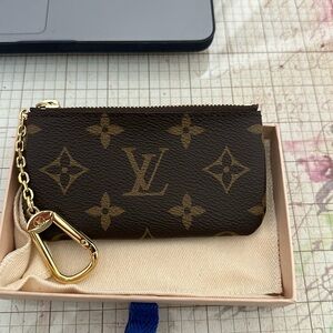Louis Vuitton authentic Key pouch. Monogram material.